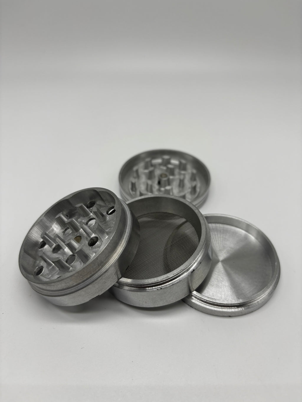 Grinder metálico