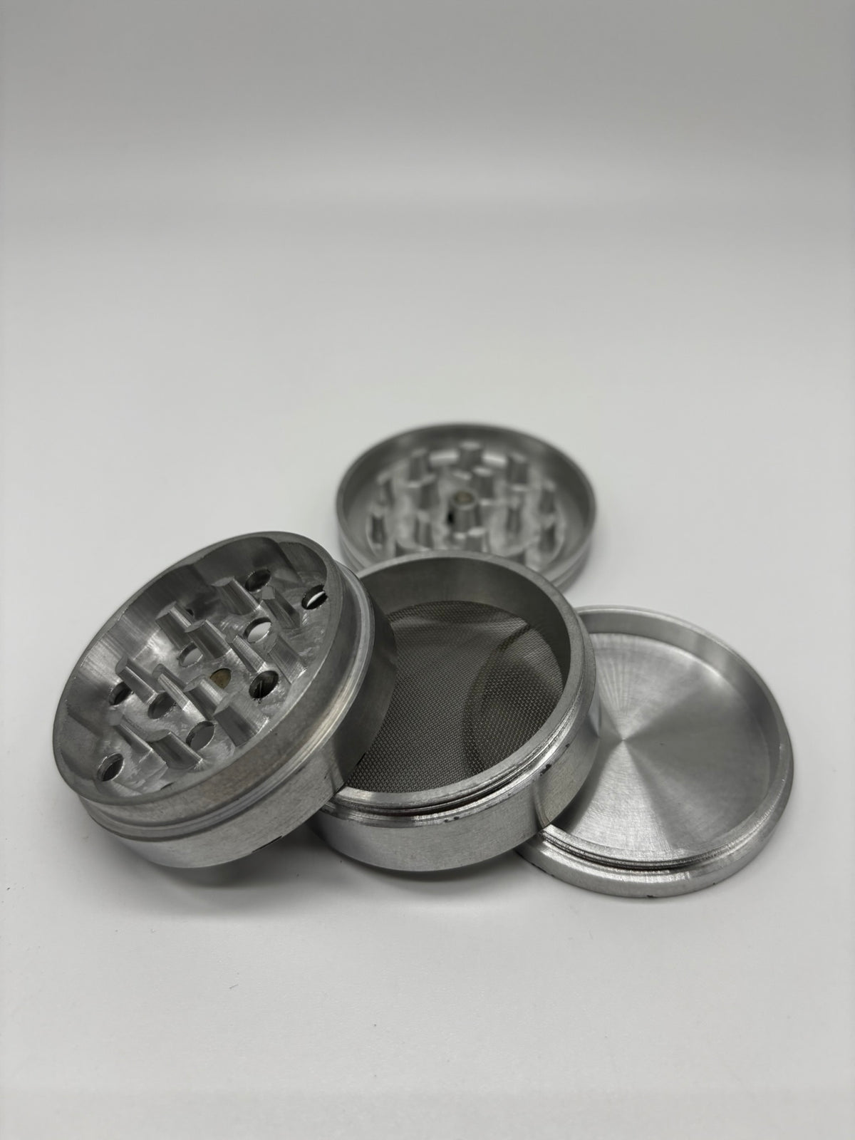 Grinder metálico