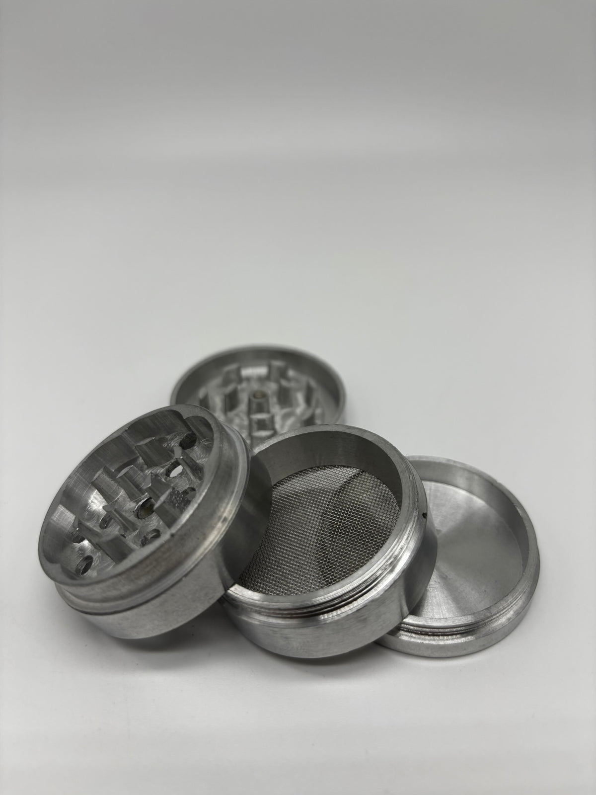 Grinder metálico